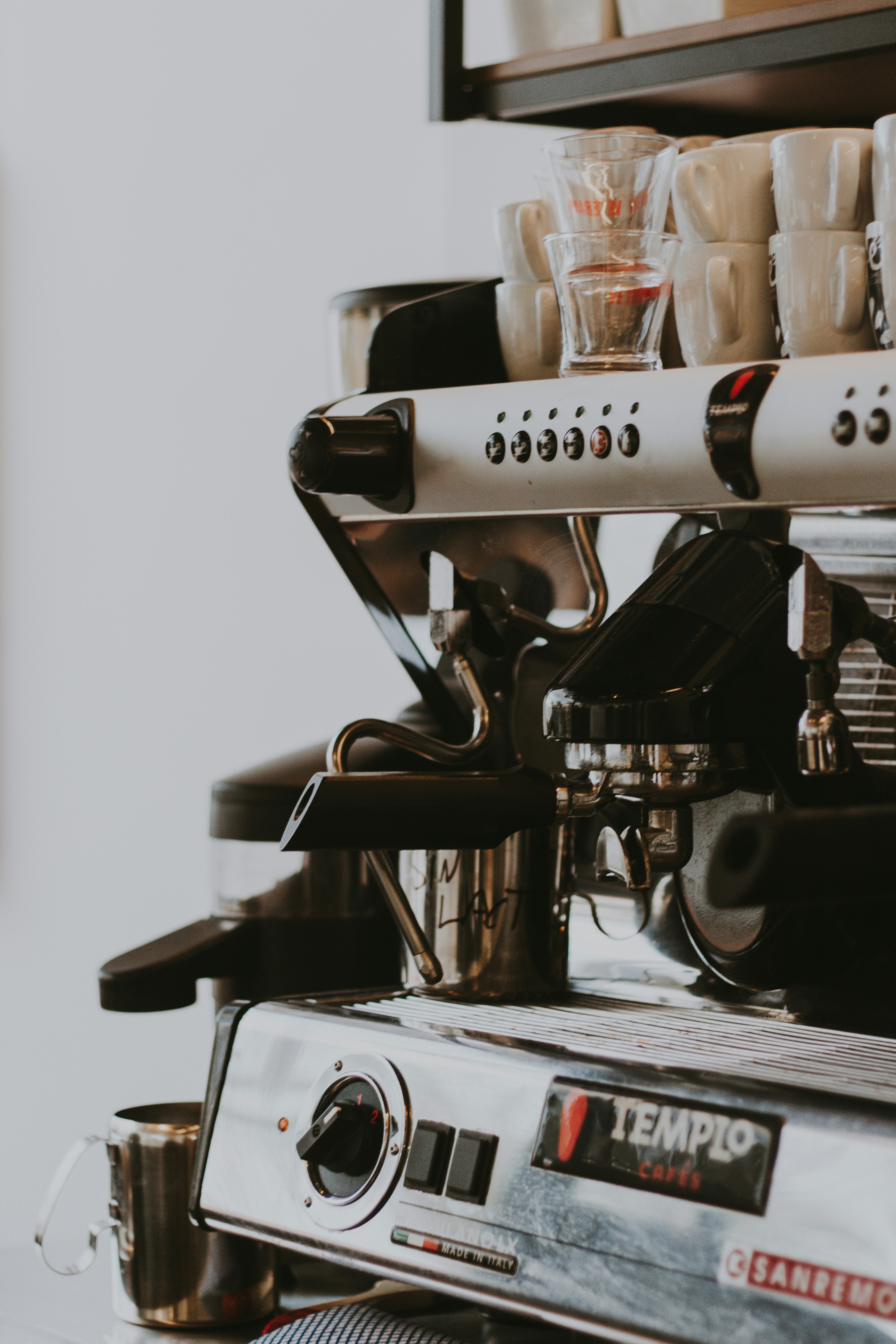 silver and black espresso machine